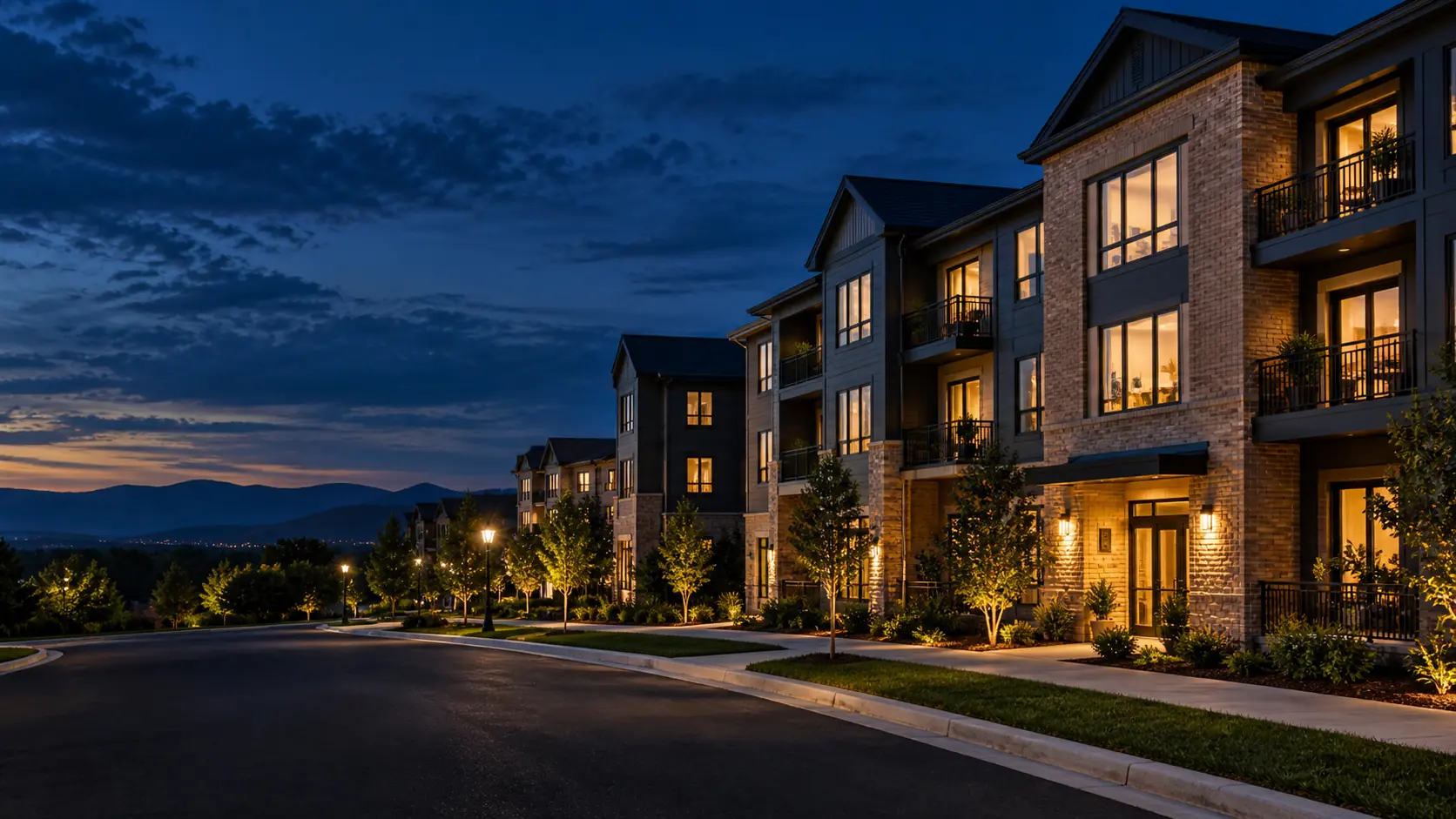 A well-maintained multifamily community at dusk